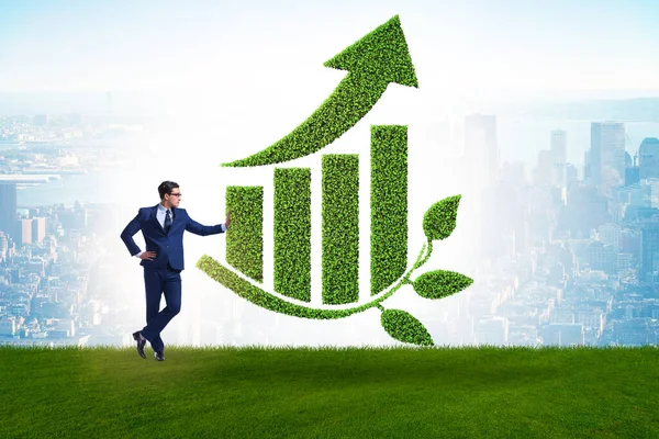 Концепція зростання зеленої економіки з бізнесменом — стокове фото