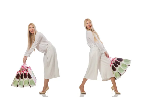 Жінка з сумками на білому — стокове фото
