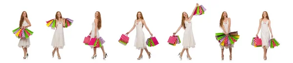 Donna con shopping bags isolata su bianco — Foto Stock