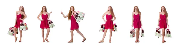 Femme avec des sacs à provisions isolés sur blanc — Photo