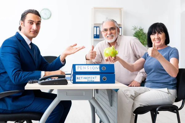 Financial advisor giving retirement advice to old couple