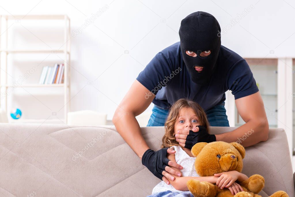 Child trafficking and abuse concept with small girl