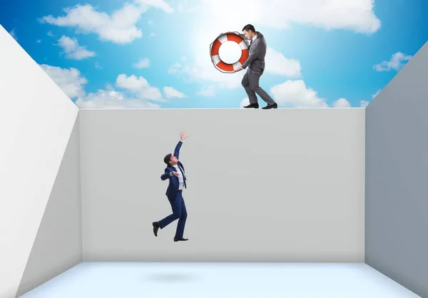 Businessman saving colleague with lifebuoy — Stock Photo, Image