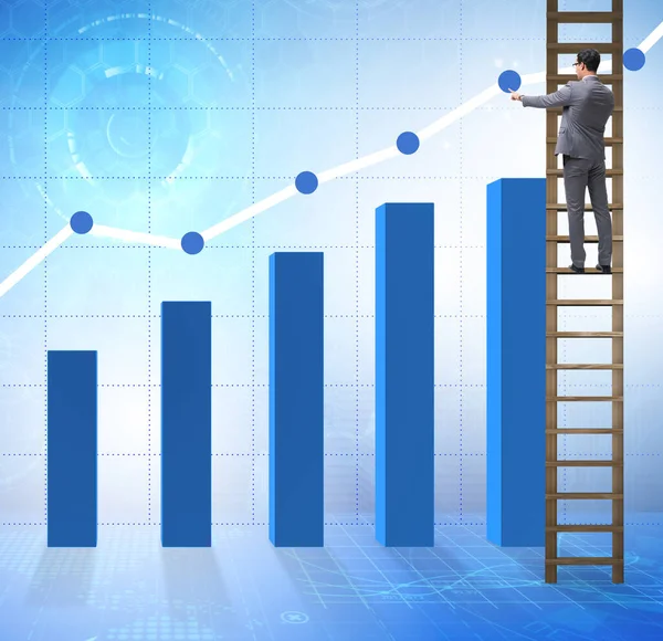 Zakenman klimmend naar groei in statistieken — Stockfoto