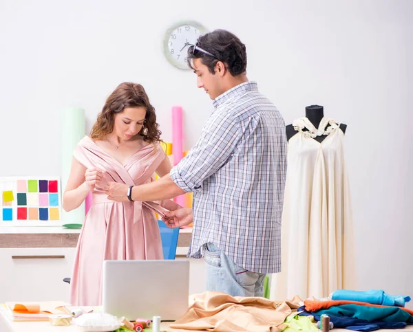 Young tailor working in his workshop — Stock Photo, Image