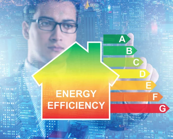 Zakenman in het concept energie-efficiëntie — Stockfoto