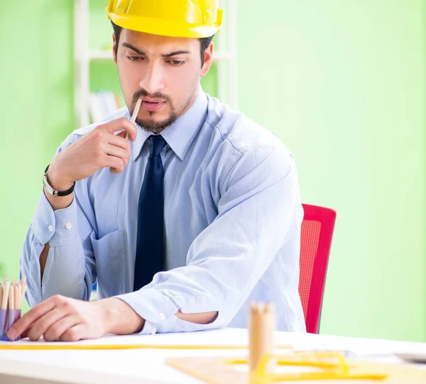 Young male architect working at the project — Stock Photo, Image