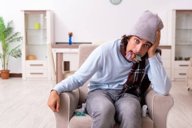 Genç adam evde grip olmuş.