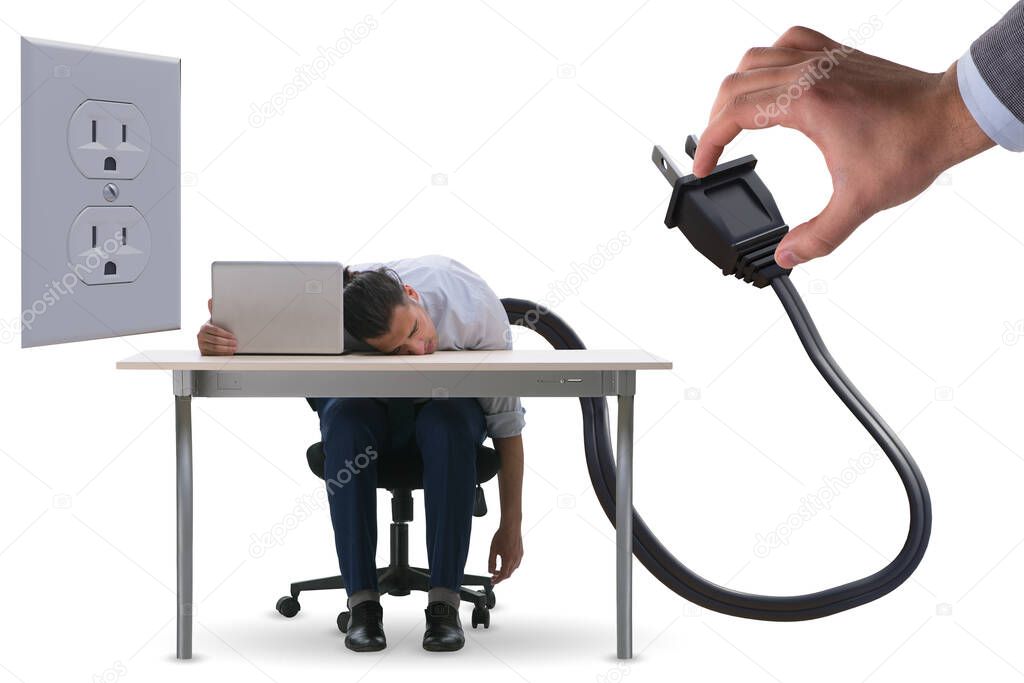 Businessman losing energy to work