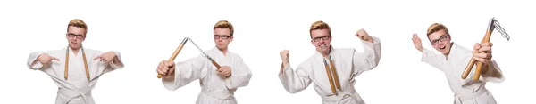 Divertido luchador de karate con nunchucks en blanco — Foto de Stock