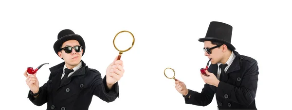 Young detective with pipe and magnifying glass — Stock Photo, Image