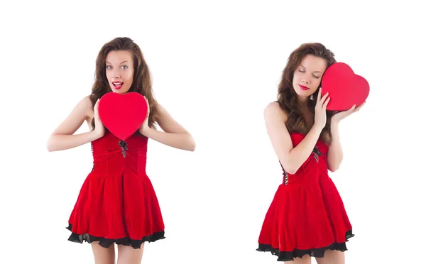 Jong meisje in rode jurk met hart kist geïsoleerd op wit — Stockfoto