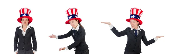 Junge Frau mit amerikanischen Symbolen auf weißem Grund — Stockfoto