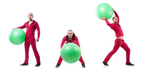 Homem com bola suíça fazendo exercícios em branco — Fotografia de Stock