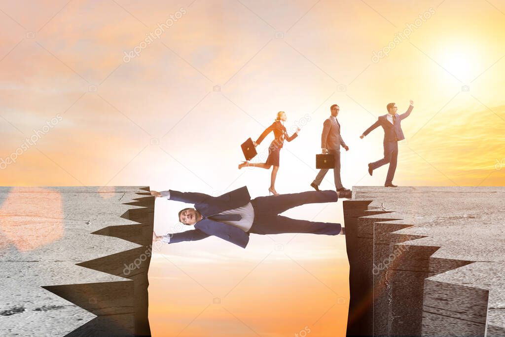 Businessman acting as a bridge in support concept
