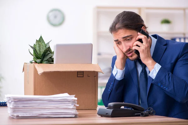 Young man being fired from his work — Stock Photo, Image