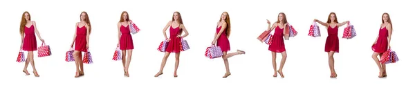 Mulher com sacos de compras isolados em branco — Fotografia de Stock