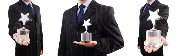 Businessman with star award isolated on white — Stock Photo, Image