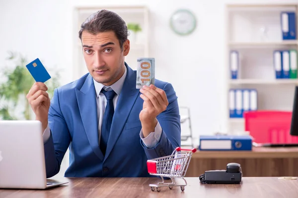 Young male businessman in ecommerce concept — Stock Photo, Image