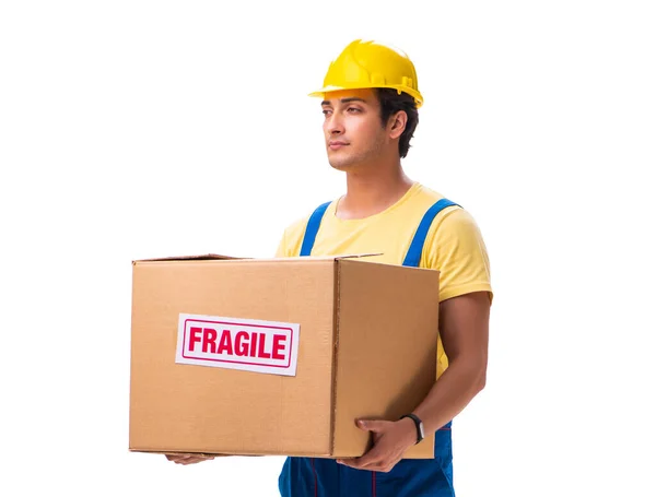 Junger Bauunternehmer mit fragilen Boxen auf weißem Grund — Stockfoto