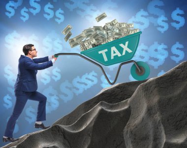 İşadamı vergi arabalarını yokuş yukarı itiyor