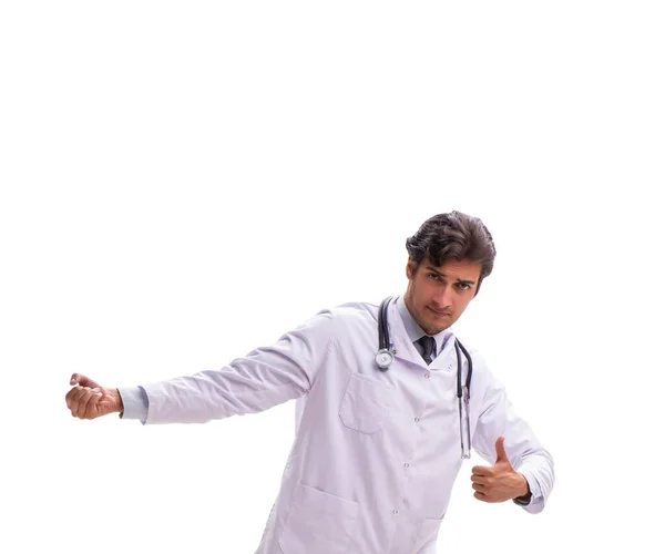 Young handsome doctor under pressure isolated on white — Stock Photo, Image