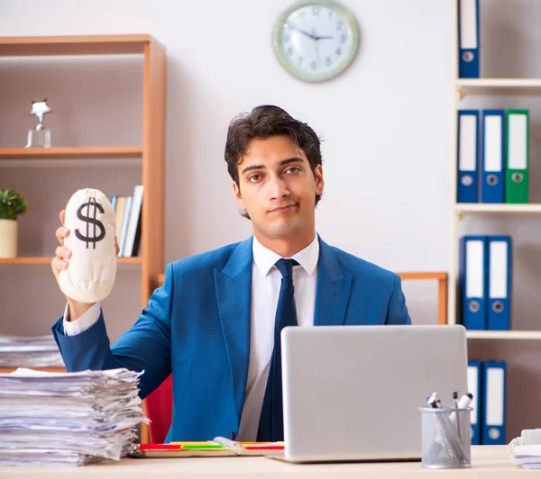 Young handsome businessman working in the office — Stock Photo, Image