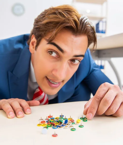 Office prank with sharp thumbtacks on chair — Stock Photo, Image