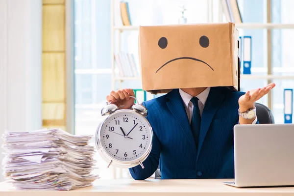 Unhappy man with box instead of his head — Stock Photo, Image
