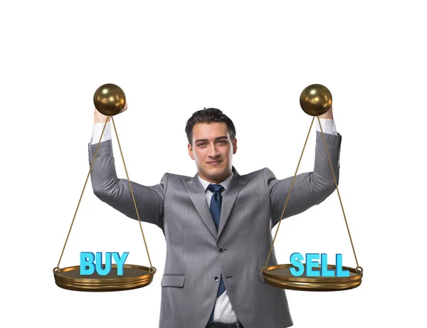 Businessman choosing between buying and selling — Stock Photo, Image