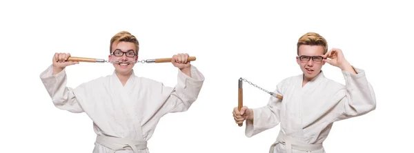 Divertido luchador de karate con nunchucks en blanco — Foto de Stock