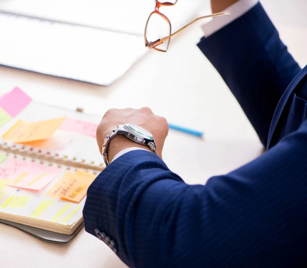 Young handsome employee planning his work activity — Stock Photo, Image