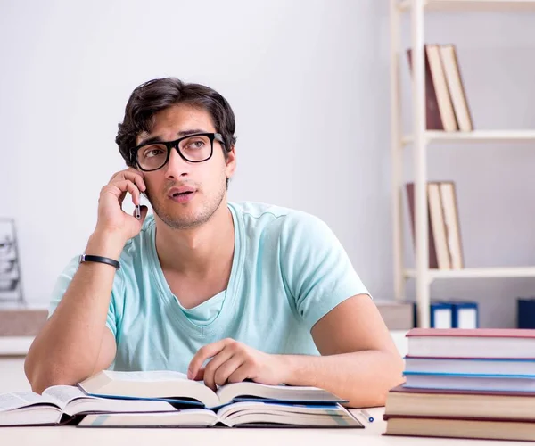 Young handsome student preparing for school exams — Stock Photo, Image