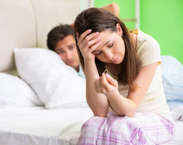 Woman and man in the bedroom after conflict — Stock Photo, Image