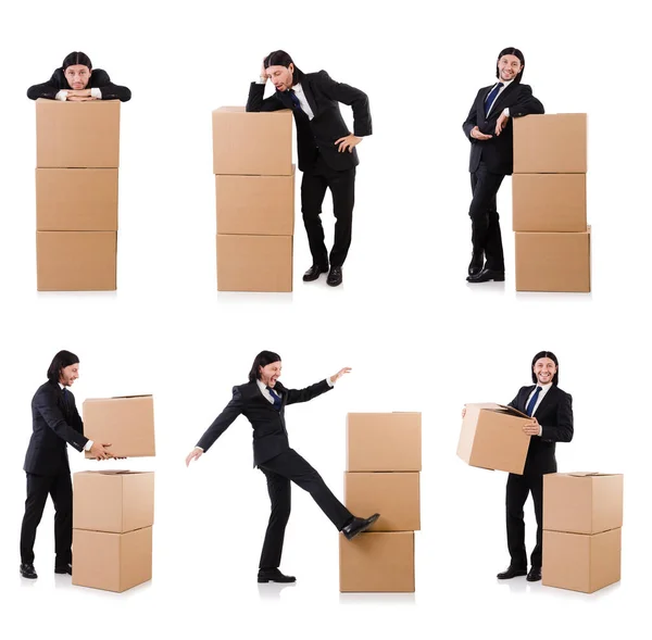 Hombre divertido con cajas en blanco — Foto de Stock