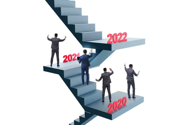 Affärsman klättra trappor på årsbasis — Stockfoto