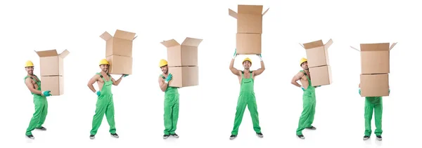 Man in green coveralls with boxes — Stock Photo, Image