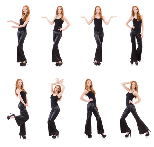 Redhead woman in black bell bottom pants on white — Stock Photo, Image