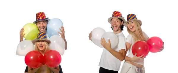 Pareja divertida con globos aislados en blanco — Foto de Stock