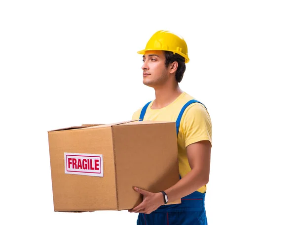 Junger Bauunternehmer mit fragilen Boxen auf weißem Grund — Stockfoto