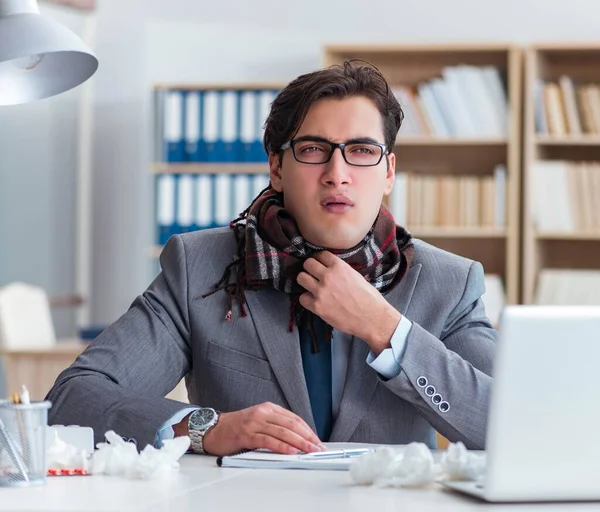 Sick businessman suffering from illness in the office — Stock Photo, Image