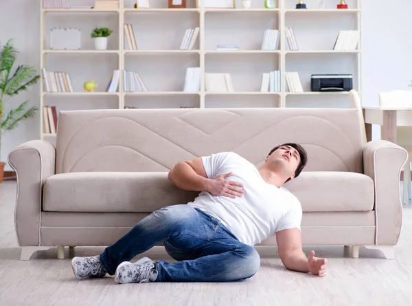 Sick man suffering at home from infection and bad stomach — Stock Photo, Image