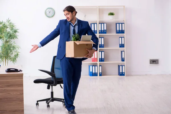 Young man being fired from his work — Stock Photo, Image