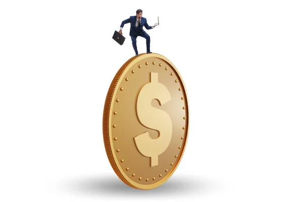 Affärsman med gigantiska gulddollar mynt — Stockfoto