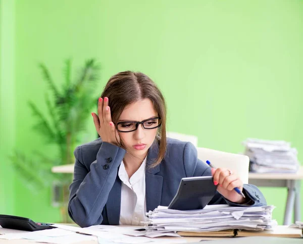 Female financial manager working in the office Stock Photo