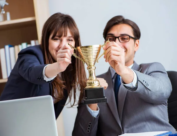 Concept of teamwork with prize — Stock Photo, Image