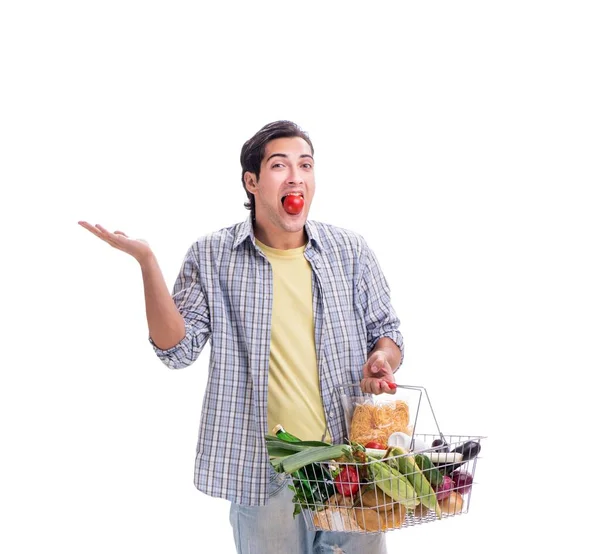 Jeune homme avec son épicerie sur blanc — Photo