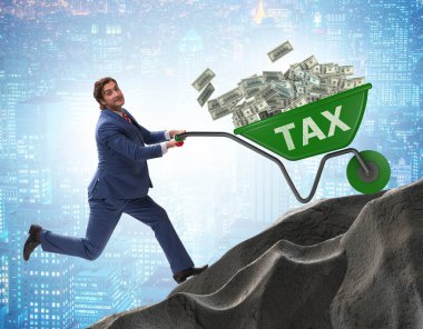 İşadamı vergi arabalarını yokuş yukarı itiyor