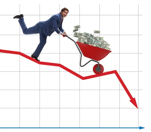 Empresario empujando carretilla de dinero por el gráfico —  Fotos de Stock