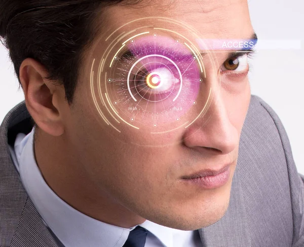 Concepto de sensor implantado en el ojo humano — Foto de Stock